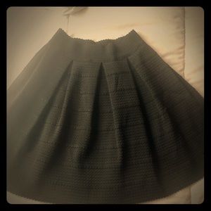 A- line pleated skirt. Only worn once!